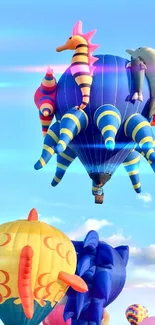 Colorful hot air balloons against a bright blue sky.