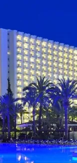 Vibrant poolside view with palm trees and hotel buildings under a clear sky.