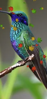 Vibrant hummingbird perched among colorful falling leaves on a branch.