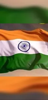 Indian flag with saffron, white, and green colors waving in the wind.