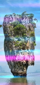 Mystical island rock with vibrant blue and pink hues in serene water backdrop.