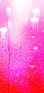 Neon jellyfish wallpaper with pink and red hues.