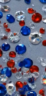 Vibrant jewels in blue, red, and silver on a textured background.