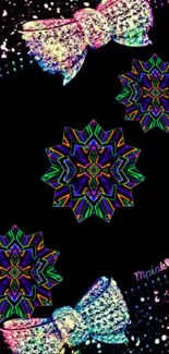 Abstract kaleidoscope art with geometric patterns and colorful bows on black.