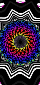 A vibrant kaleidoscope pattern in rainbow hues on a black background.