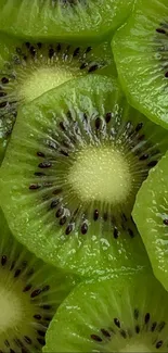 Close-up of fresh green kiwi slices forming a vibrant pattern.