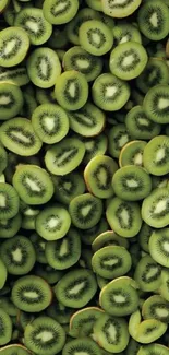 Vibrant wallpaper of fresh kiwi slices creating a lush green background.