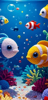 Colorful knit fish swimming in a vibrant aquarium scene.