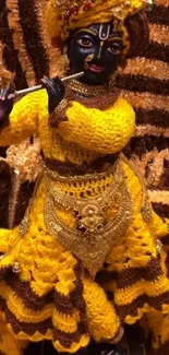 Vibrant Krishna with yellow and brown attire playing a flute.