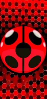 Vibrant red ladybug wallpaper with hexagonal background.