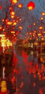 Lantern-lit street at night with reflections on wet pavement.