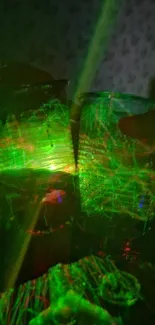 Neon green laser light artwork in darkness