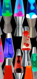 Vibrant collection of colorful lava lamps against a black background.