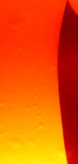 Vibrant red and orange abstract wallpaper with a lava lamp effect.