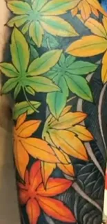 Colorful tattoo leaves on a black background.