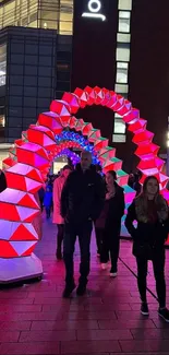 Vibrant urban LED arches glowing at night.