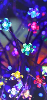 Vibrant neon LED flowers glowing on branches.