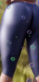 Purple leggings with bubbles on a blurry natural background wallpaper.