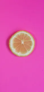 A slice of lemon on a vibrant pink background, perfect for a mobile wallpaper.