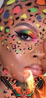 Vibrant leopard makeup with a butterfly accent on a woman's face.