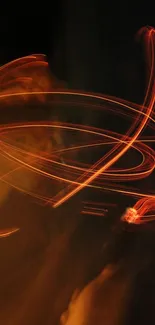 Vibrant orange light swirls on a dark background mobile wallpaper.