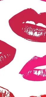 Vibrant red and pink lip prints on white background.