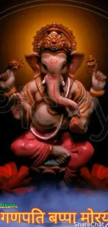 Vibrant statue of Lord Ganesha with glowing background.