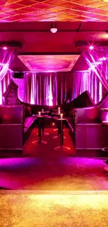Vibrant lounge with neon purple lighting and stylish decor.