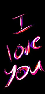 Vibrant neon "I love you" text on black background.