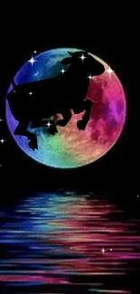 Colorful moon with cow silhouette against starry night sky.