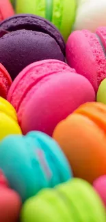 Vibrant multicolored macarons in a vibrant phone wallpaper.