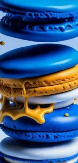 Vibrant blue and orange macarons stacked on a mobile wallpaper.