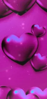 Magenta mobile wallpaper with glossy heart shapes.