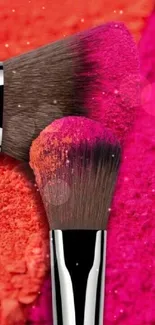 Vibrant makeup brushes with pink and orange hues.