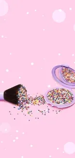 Vibrant pink wallpaper with makeup sprinkles.