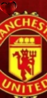 Manchester United emblem on vibrant red background.