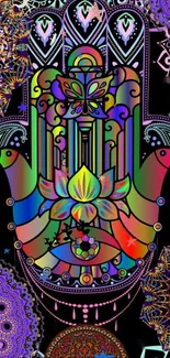 Vibrant mandala and hamsa design with colorful details on black background.