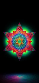 Vibrant mandala on black background mobile wallpaper, featuring bright colors.