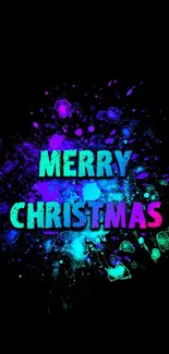 Colorful 'Merry Christmas' text on black background in vibrant splashes.