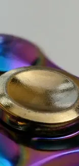 A close-up of a vibrant metallic spinner with a golden center.