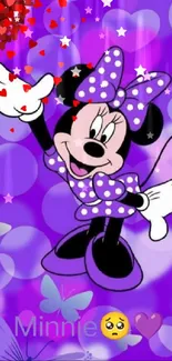 Minnie in purple with hearts and butterflies background.