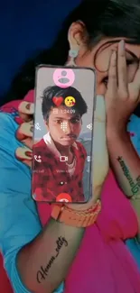 Girl holding smartphone with unique design.