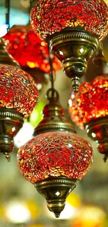 Vibrant red mosaic lanterns wallpaper with glowing light.