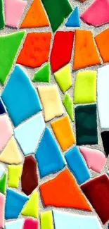 Colorful mosaic wallpaper with vibrant geometric shapes.