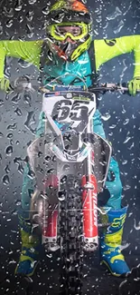 Motocross rider in neon gear with smoke backdrop.