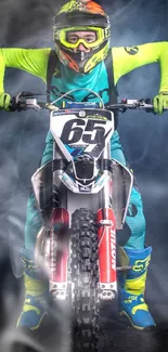 Motocross rider in vibrant neon gear on bike facing forward.