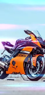 Vibrant orange and purple motorcycle wallpaper.