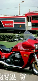 Red motorcycle in urban scenery with city bus.