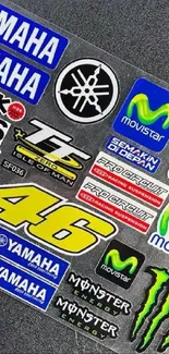 Colorful motorsport stickers with Yamaha and Monster Energy logos on grey background.