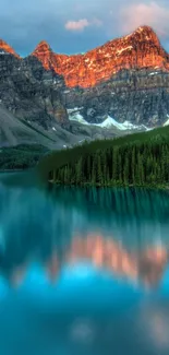 Breathtaking mountain view with lake reflection at sunset.